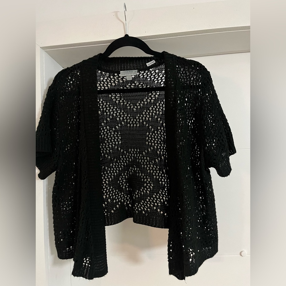 Black shrug , size large. Crochet knit like.